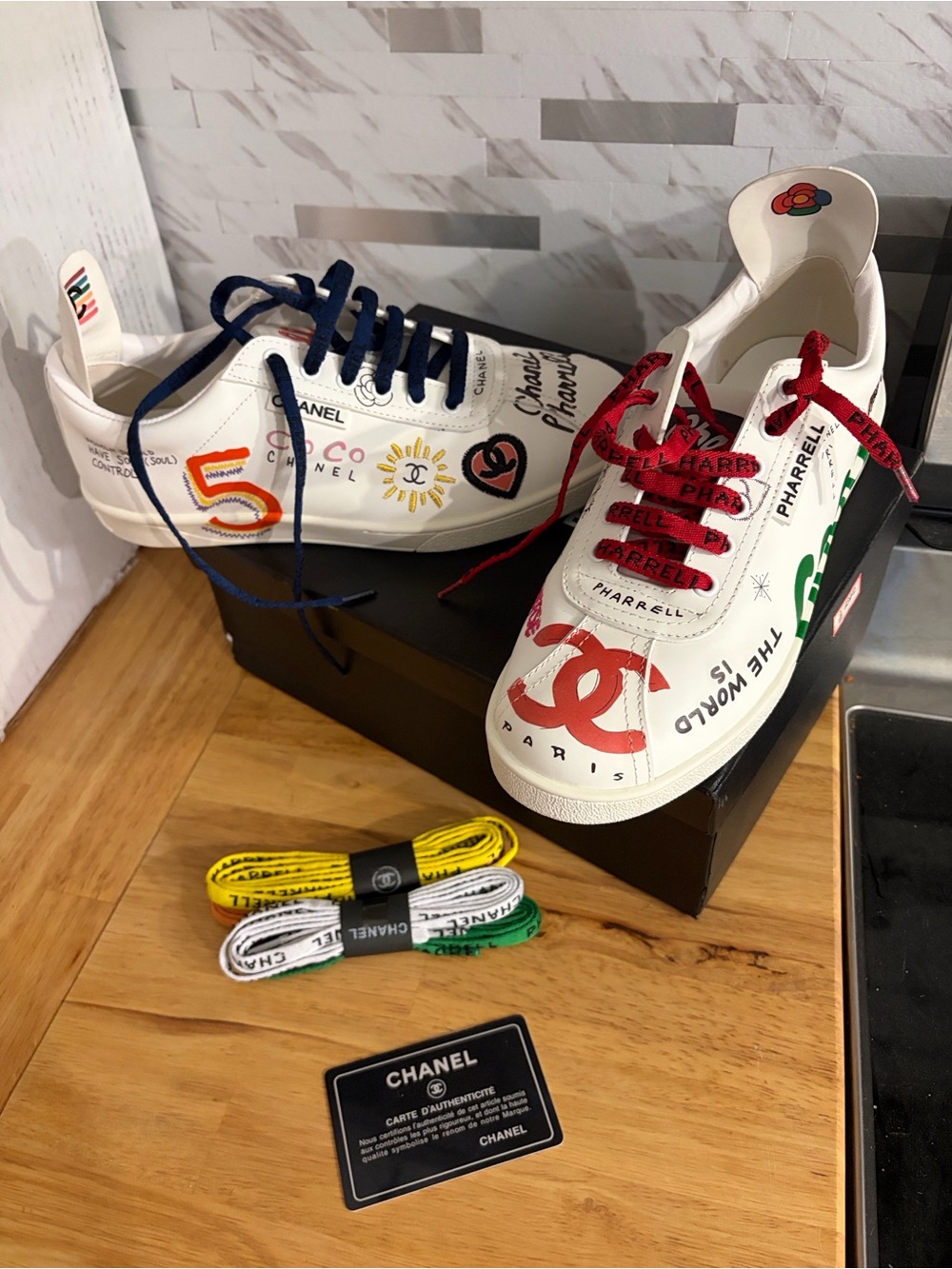 CHANEL White Kids Sneakers with Red and Navy Graphic Accents